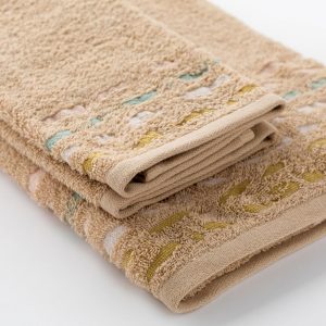dettaglio asciugamano con ospite Gatsby di Riviera in spugna jacquard tortora