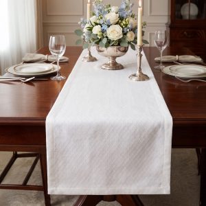 Runner gloriella in tessuto raso jacquard avorio con disegno a treccia con fiorellini