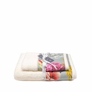 asciugamano con ospite Vindra di Creole Home color panna con balza floreale in raso