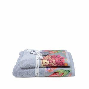asciugamano con ospite Vindra di Creole Home color sion con balza floreale in raso
