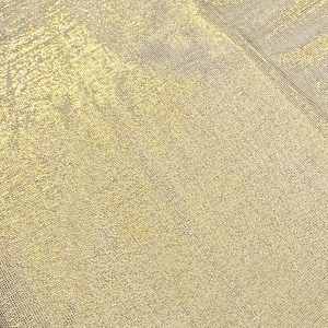 dettaglio tovaglia natalizia d'oro in lurex con brillantini di Bassetti